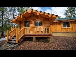 rustic woodland log cabin al near