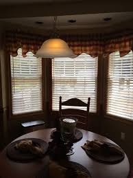 A bright breakfast nook with pella bay window adds space, seating and storage to the family room/kitchen addition. Bay Window Kitchen Curtain That Looks Great In My Kitchen Hometalk