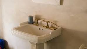 how to hide pedestal sink plumbing