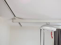 ceiling mounted vs wall mounted hoist