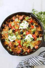 Warm taco shells and fill with meat, cheese, tomatoes, lettuce and top with sour cream or avocado. Easy Taco Casserole Keto Mexican Caserole Whole Lotta Yum