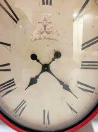 Red Cafe Des Marguerites Wall Clock 38