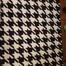 plush houndstooth area rug in