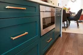 turquoise kitchen cabinets around built