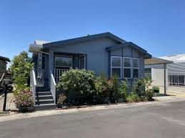 california manufactured home own land