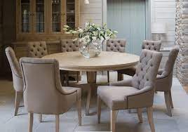Cast aluminium garden dining table and six chairs in green. Natural Pale Oak Dining Table Construction Takes Inspiration From Classic Antiques Pair Round Dining Room Sets Round Dining Room Table Round Dining Table Sets