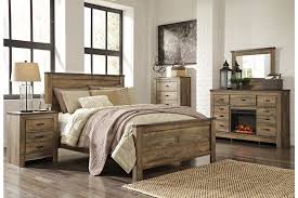 These sets are crafted to work in harmony; Trinell Queen Panel Bed Ashley Furniture Homestore