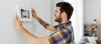 how to hang pictures without nails