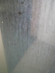 shower from hard water stains