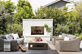 Patio With White Brick Fireplace And