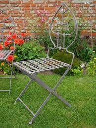 mid century wrought iron garden chairs