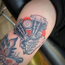engine tattoo on the upper arm