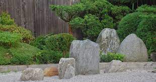 Arranging Stones In A Japanese Style Garden