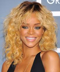 The blunt edges give a very sharp effect to the mohawk and the blonde hue makes it distinctive. Rihanna Golden Blonde Hair For Dark Skin Jamila Kyari