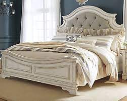 Download image more @ www.furniturepick.com. Realyn Queen Upholstered Panel Bed Ashley Furniture Homestore