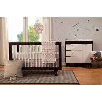 This set includes a crib, a dresser, and a changing table, all made from solid pine wood with a light wood tone. Modern Crib And Changing Table Nursery Furniture Sets Allmodern