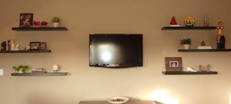 tv with floating shelves