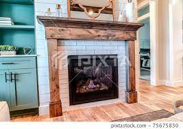 modern fireplace with wooden frame