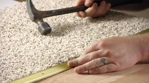 how to install hardwood to carpet