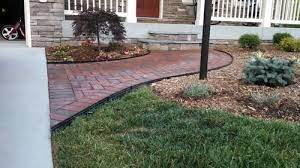 For an arizona backyard, we have a lot of grass and a very large area of brick linear edged border. Remove Paver Edging