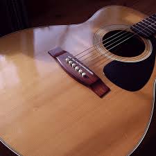 clical vs acoustic guitar for