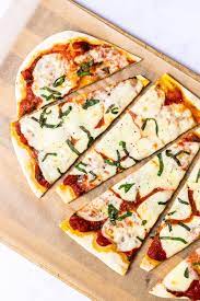 This recipe is a quick and easy way to enjoy homemade pizza using things you probably already have in your pantry. Flatbread Pizza Dough Love And Good Stuff