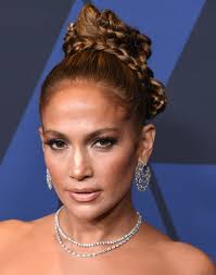Don't be fooled by the rocks that she got. Jennifer Lopez Wears Braided Updo At 2019 Governors Awards Photo Allure