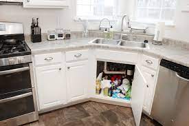 how to organize under your kitchen sink