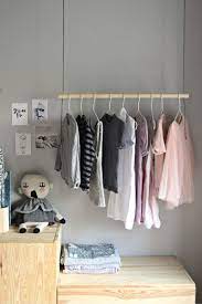 with this diy hanging clothes rack
