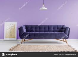 purple velvet sofa beige rug pastel