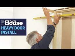 how to install heavy interior doors