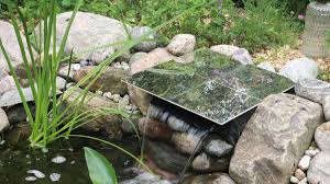 how to hide a pond waterfall spillway box