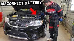 How to jump start a dodge journey with hidden battery. How To Disconnect Car Battery On Dodge Journey Fiat Freemont Youtube