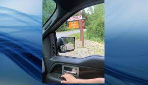 Provincial Park Sign Impeding Driver