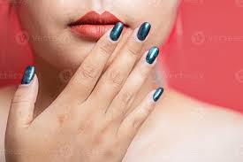 beauty model with green manicure
