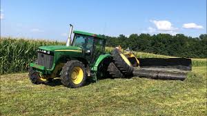 John Deere 8120 Broken Axle while merging hay. - YouTube
