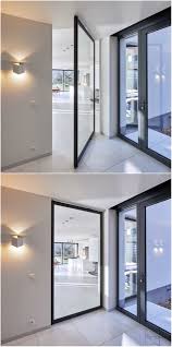 Large Glass Pivoting Door With Offset Axis Pivot Hinges The