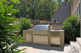 Outdoor kitchen with dining area. Outdoor Kitchen Layouts Samples Ideas Landscaping Network