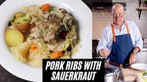 andrew zimmern cooks pork ribs with
