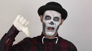 terrible man clown makeup showing thumb