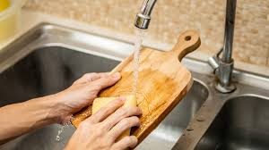 safer wood vs plastic cutting boards