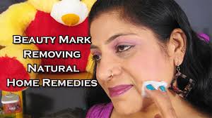 remove beauty mark and dark spots