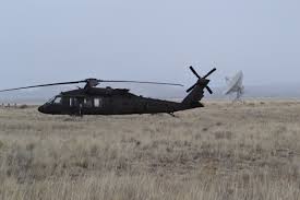 uh 60 blackhawk helicopters land at the