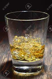 glass of jim beam bourbon whiskey on