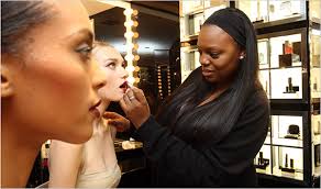 a celebrity makeup artist dusts her