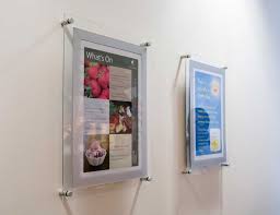 A3 Poster Displays Wall Mounted In Cafe