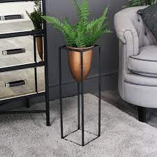 Exquisitely carved designs decorate your garden, pots and make people notice introductions: Tall Copper Bullet Plant Stand