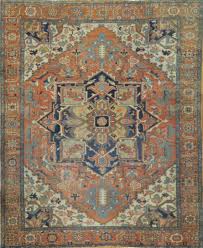 red and blue persian serapi rug
