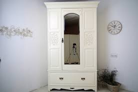 antique wardrobe with mirrored door