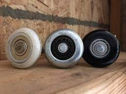 steel vs nylon garage door rollers the